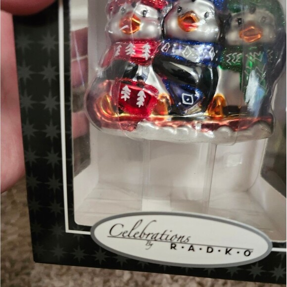 Christopher Radko Celebrations Three Winter Penguins Sled Blown Glass Ornament - Picture 5 of 8